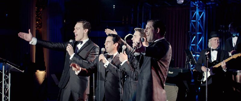 Erich Bergen (from left), John Lloyd Young, Vincent Piazza and Michael Lomenda star in Warner Bros. Pictures’ musical Jersey Boys. It came in fourth at last weekend’s box office and made about $13.3 million.