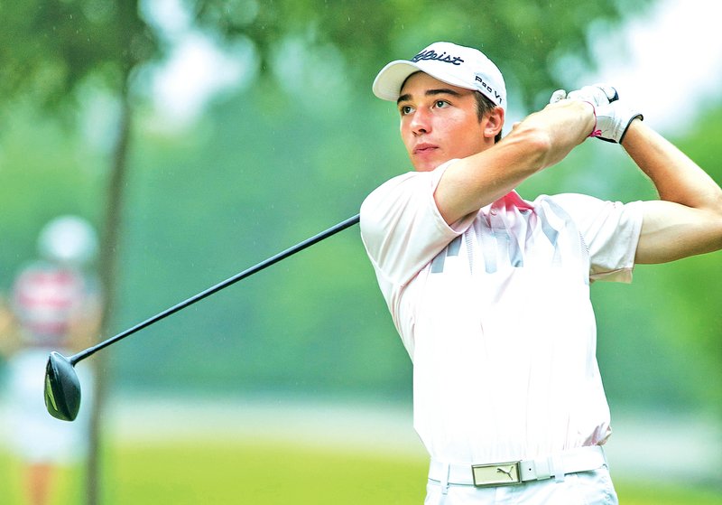 STAFF PHOTO ANTHONY REYES Ryan Spurlock of Maumelle watches his tee shot Monday from hole No. 10 during the ASGA Stroke Play tournament at Shadow Valley Country Club in Rogers.