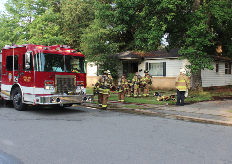 Little Rock fire crews work at a fire Wednesday morning at 3300 Wynne St.