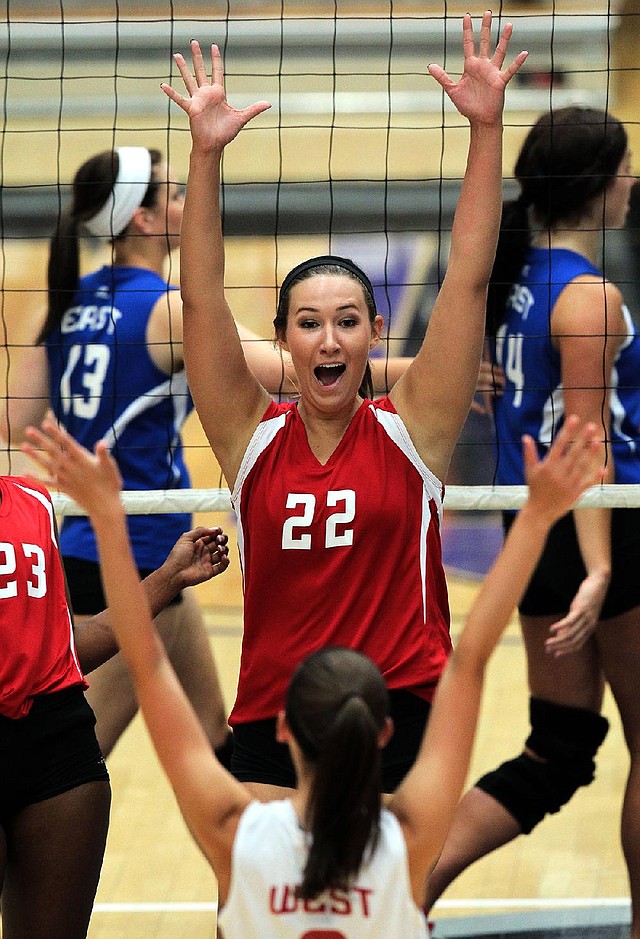 Shiloh Christian’s Brittany Butler of the West All-Stars celebrates a point during Wednesday night’s volleyball game.