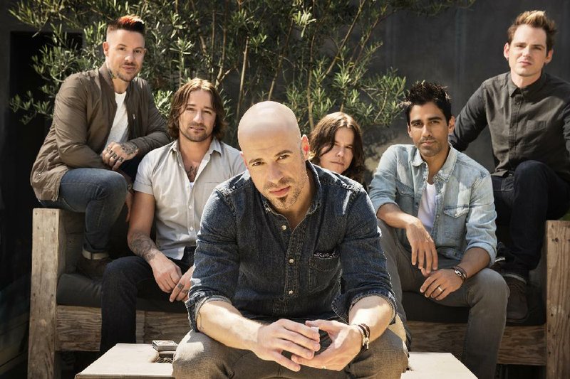 Daughtry is fronted by lead singer Chris Daughtry (center).