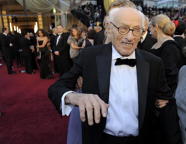 Eli Wallach attends the Academy Awards in 2011 in Hollywood. Wallach, the raspy-voiced character actor who starred in dozens of movies and Broadway plays over a long career died Tuesday. 