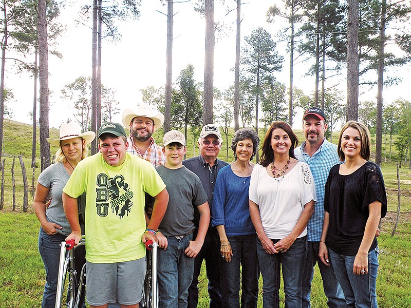 The Gross Family of Hot Springs has been named the 2014 West Central District Farm Family of the Year and the 2014 Garland County Farm Family of the Year. The family includes Billy and Mary Gross and their sons, Steve and Scott and their families. Back row, from the left, are Stacy and Steve Gross with their sons, front row, Colton and Seth; and back row, center, Billy and Mary Gross; and back row, right, Scott Gross and his wife, Kay, front row, second from right, and their daughter, Lauren Gross Ault, front row, right. Not shown is Scott and Kay’s son, Allan Gross.