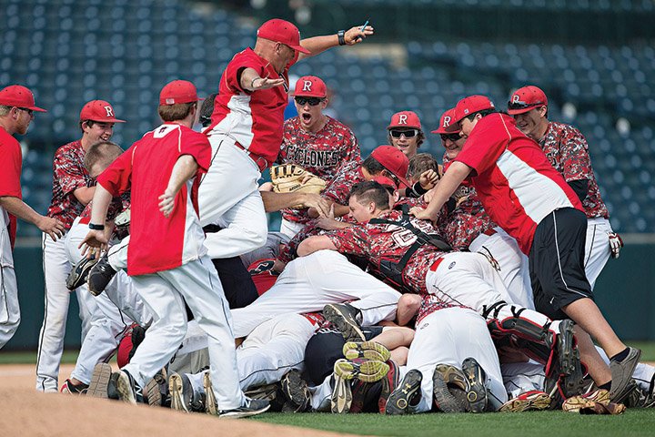 The Russellville Cyclones celebrate after winning the Class 6A state championship against the Marion Patriots at Baum Stadium in Fayetteville last month.