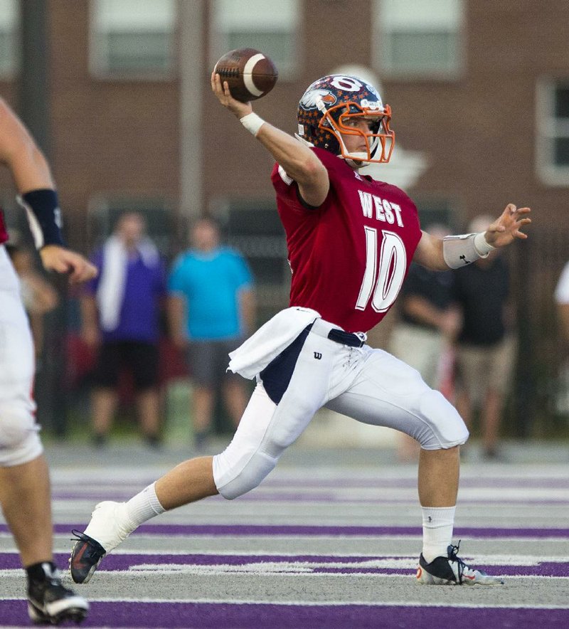 Arkansas Democrat-Gazette/MELISSA SUE GERRITS - 06/27/2014 -  West's Josh Qualls makes a pass during the High School All Star football game June 27, 2014 at UCA in Conway. 