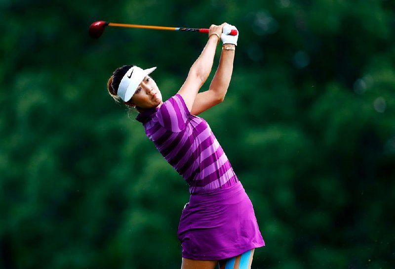 Reigning U.S. Women’s Open champion Michelle Wie shot her second consecutive 5-under 66 at Pinnacle Country Club in Rogers and has a two-shot lead over So Yeon Ryu in the LPGA Wal-Mart Northwest Arkansas Championship. A total of 72 players were unable to finish the second round Saturday.