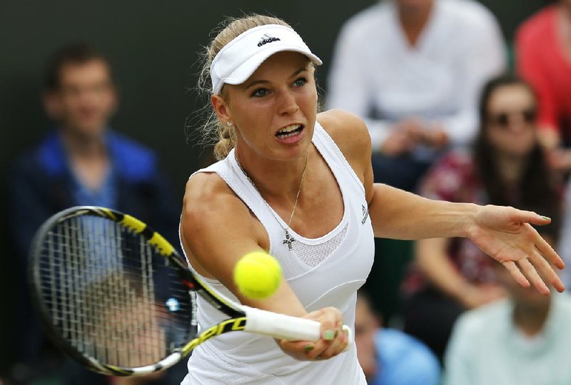 Caroline Wozniacki told an Irish newspaper she sees nothing wrong with the all-white dress code at Wimbledon, which now includes undergarments. Others like former champion Pat Cash say the rule is archaic.