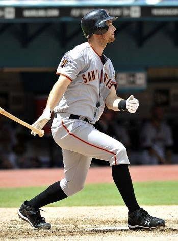San Francisco Giants' Brandon Belt connects for a solo home run in the sixth inning against the Florida Marlins during an baseball game in Miami, Sunday, Aug 14, 2011. The Giants won 5-2. (AP Photo/Steve Mitchell