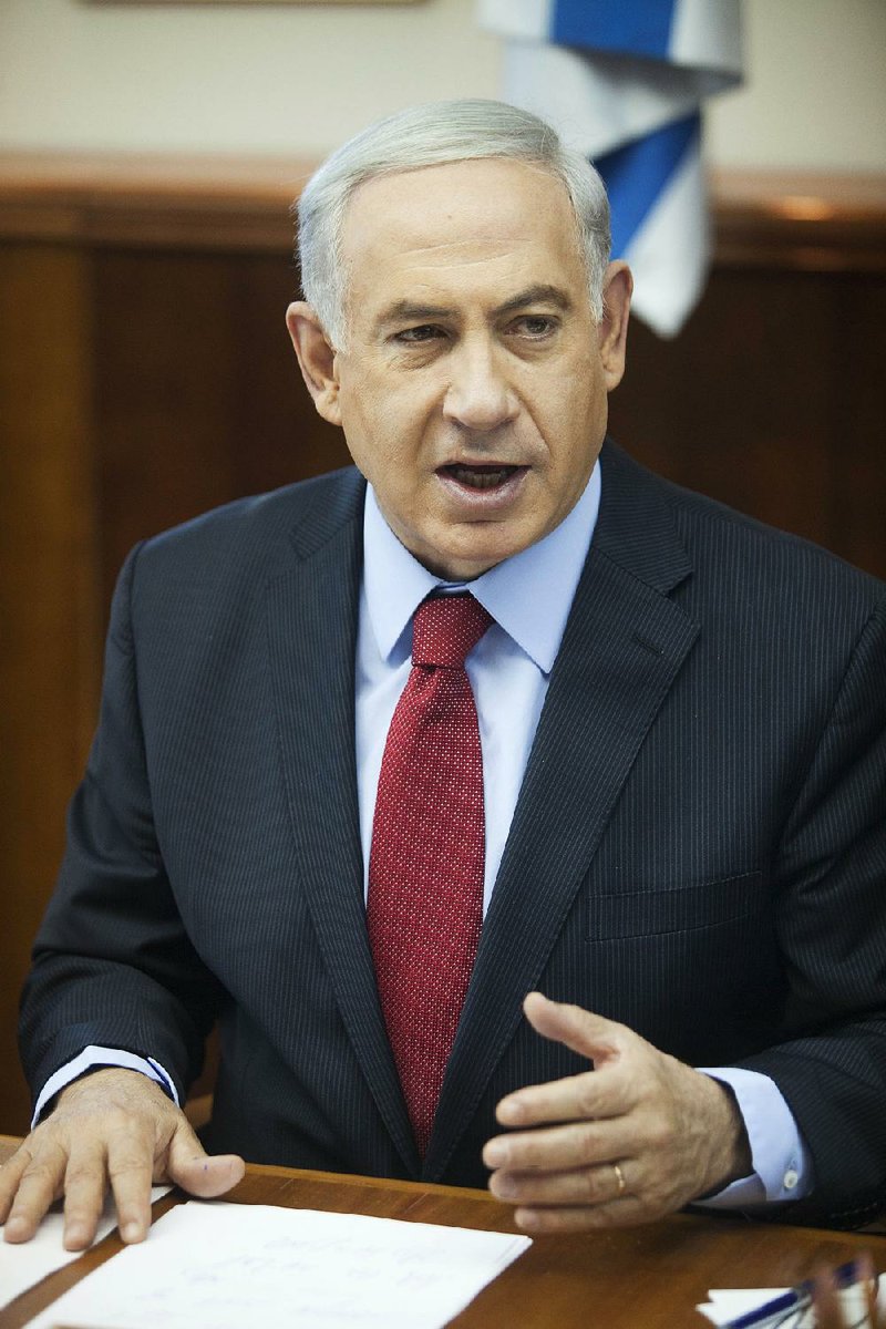 Israeli Prime Minister Benjamin Netanyahu speaks during a cabinet meeting in Jerusalem, Sunday, June 29, 2014. (AP Photo/Dan Balilty, Pool)
