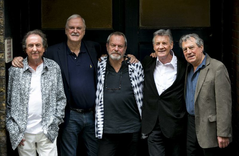 From left, Eric Idle, John Cleese, Terry Gilliam, Michael Palin and Terry Jones of the comedy group Monty Python pose for photographers during a photo call in London Monday, June 30, 2014, to promote their reunion for a series of concerts. The group had its first big success with the Monty Python's Flying Circus TV show, which ran from 1969 until 1974, winning fans around the world with its bizarre sketches. (Photo by John Phillips Invision/AP Images)