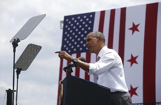 President Barack Obama speaks about transportation and the economy Tuesday at the Georgetown Waterfront Park in Washington. Gridlock in Washington will lead to gridlock across the country if lawmakers can’t quickly agree on how to pay for transportation programs, Obama administration officials warn.