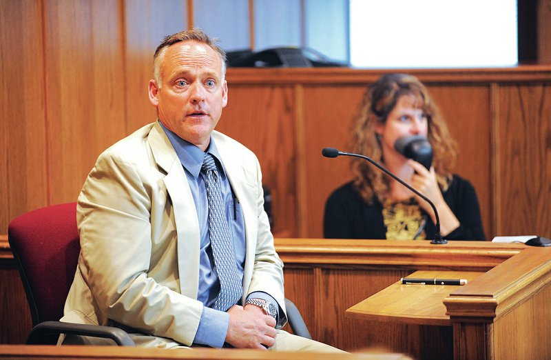 STAFF PHOTO ANDY SHUPE John Brooks, crime scene investigator with the Fayetteville Police Department, speaks Tuesday while testifying during Josh Melton&#8217;s second-degree murder trial at the Washington County Courthouse in Fayetteville.