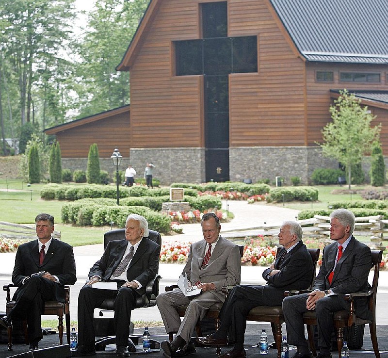 The Rev. Billy Graham (left) sits with former presidents George H.W. Bush, Jimmy Carter and Bill Clinton during a dedication ceremony for the Billy Graham Library in Charlotte, N.C., on May 31, 2007. Known the world over for his evangelistic crusades, Graham’s revivals weren’t always successful.