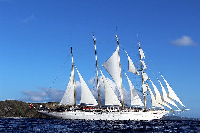 The Star Clipper sets sail from South Friar’s Bay at St. Kitts. Clipper ships were developed in the middle of the 19th century as very fast sailing ships. The Star Clipper resembles the old clipper ships but was built in 1992 for luxury cruising and carries 170 passengers.