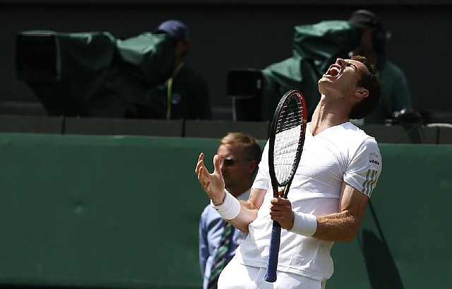 Defending Wimbledon champion Andy Murray reacts after missing a point in a three-set loss to Grigor Dimitrov of Bulgaria on Wednesday. Murray committed 37 unforced errors in the match.