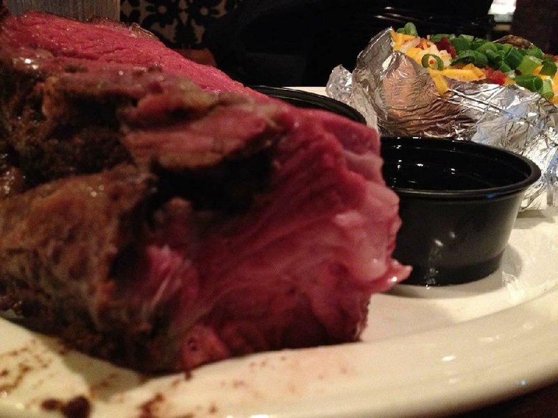 The 20-ounce prime rib with loaded baked potato at The Butcher Shop.