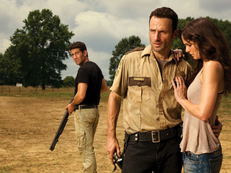 The Walking Dead “Dead, White and Blue” marathon will feature (from left) Jon Bernthal as Shane Walsh, Andrew Lincoln as Rick Grimes and Sarah Wayne Callies as Lori Grimes.