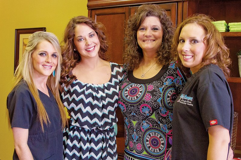 From left, Brooke Peterson, Valarie Freeland, Tonja Shourd and Emory Wilborn work at The Cleaning Company by Single Moms, the new business venture Shourd started to support single mothers.