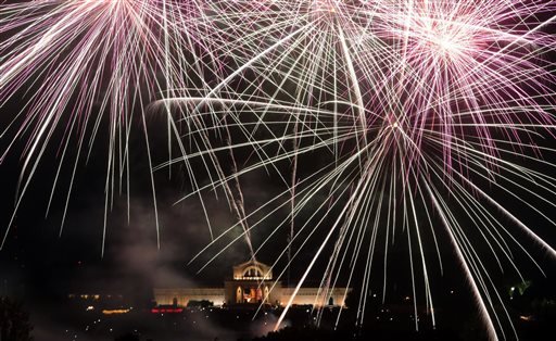 Fair St. Louis fireworks illuminate the sky in front of the St. Louis Art Museum on Wednesday, July 3, 2014, in St. Louis, Mo. Americans prepared to celebrate the nation's 238th birthday on Friday. 
