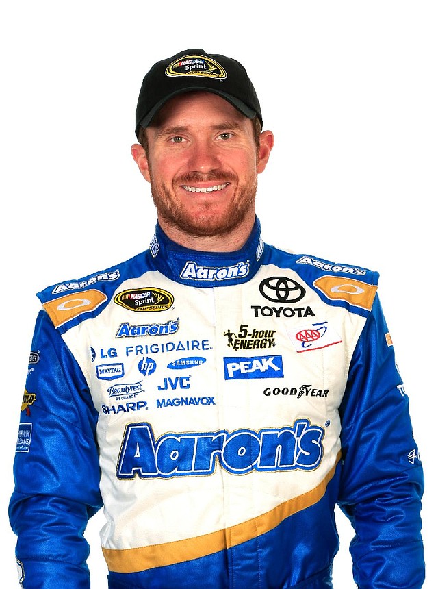 DAYTONA BEACH, FL - FEBRUARY 13:  NASCAR Sprint Cup Series driver Brian Vickers poses during the 2014 NASCAR Media Day at Daytona International Speedway on February 13, 2014 in Daytona Beach, Florida.  (Photo by Jamie Squire/NASCAR via Getty Images) 