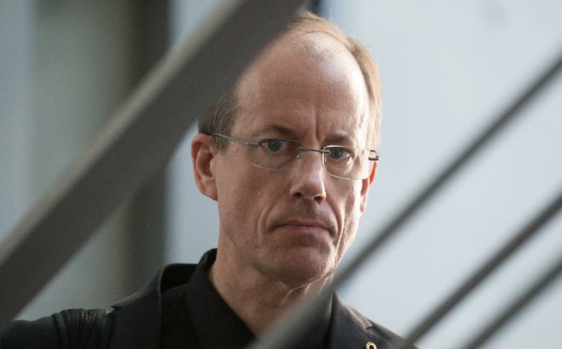 In this picture taken Thursday evening July 3, 2014, former NSA employee Thomas Drake arrives at the parliamentary NSAinvestigation committee   in Berlin, Germany,  German lawmakers began hearing expert testimony for a probe into the activities of foreign intelligence agencies in Germany. The inquiry was sparked by reports based on documents leaked by former NSA contractor Edward Snowden, which showed that German citizens, including Chancellor Angela Merkel, were targeted by U.S. intelligence.   (AP Photo/dpa,Hannibal Hanschke)