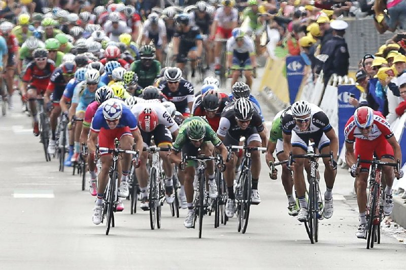 Marcel Kittel of Germany (second from right) sprints toward the finish line ahead of Norway’s Alexander Kristoff (far right) and France’s Arnaud Demare to win Tuesday’s fourth stage.