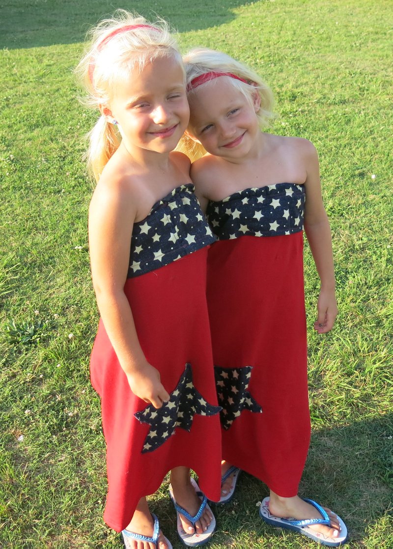 Photo by Susan Holland Sisters Allison Hursh and Graclyn Hursh, of Gravette, were dressed appropriately in their red, white and blue dresses when they came out Friday evening to enjoy the city&#8217;s annual Fourth of July celebration. A few others were seen in patriotic attire but none were any prettier than these two young ladies.