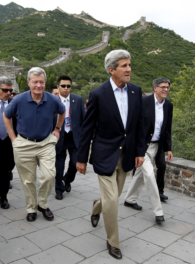 U.S. Secretary of State John Kerry, center, U.S. Ambassador to China Max Baucus, left, and Treasury Secretary Jack Lew, right, climb to the top of the Badaling Section of the Great Wall of China in Beijing, China, Tuesday, July 8, 2014.