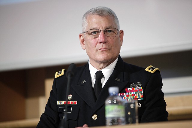 This Nov. 15, 2012, file photo shows Gen. Carter Ham, then-head of the U.S. Africa Command, at the University of Sciences Politiques, in Paris. Newly revealed testimony from top military commanders involved in the U.S. response to the Benghazi attacks suggests that the perpetrators of a second, dawn assault on a CIA complex probably were different from those who penetrated the U.S. diplomatic mission the evening before and set it ablaze, killing Ambassador Chris Stevens and another American. The second attack, which killed two security contractors, showed clear military training, retired Gen. Carter Ham told Congress in closed-door testimony released late Wednesday, July 9. 2014.