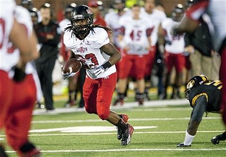 Arkansas State's J.D. McKissic runs up field after breaking a tackle after a reception during the first quarter of an NCAA college football game Saturday, Sept. 28, 2013, in Columbia, Mo. McKissic caught a school record 15 receptions in their 41-19 loss to Missouri. (AP Photo/L.G. Patterson)