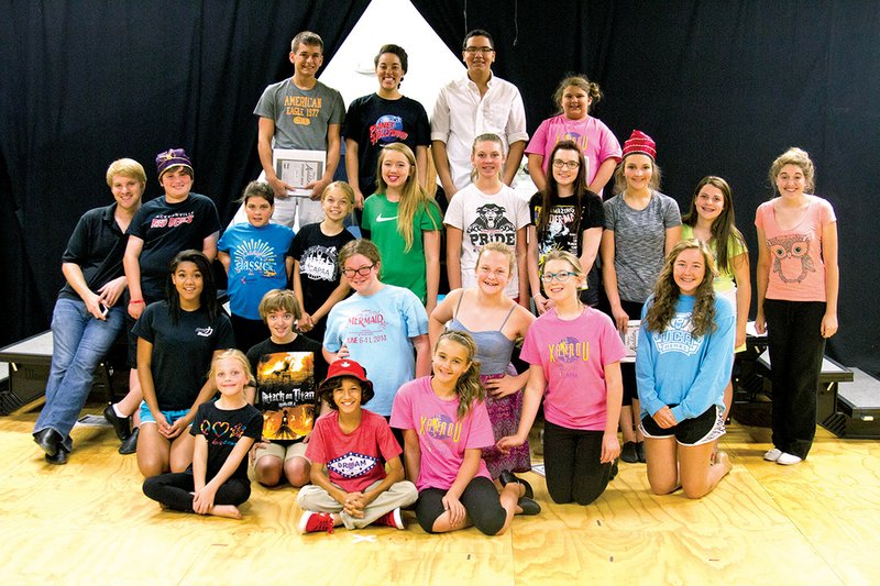The cast of Aladdin Jr. gathers after a day of rehearsal at the Central Arkansas Performing Arts Academy in Cabot.