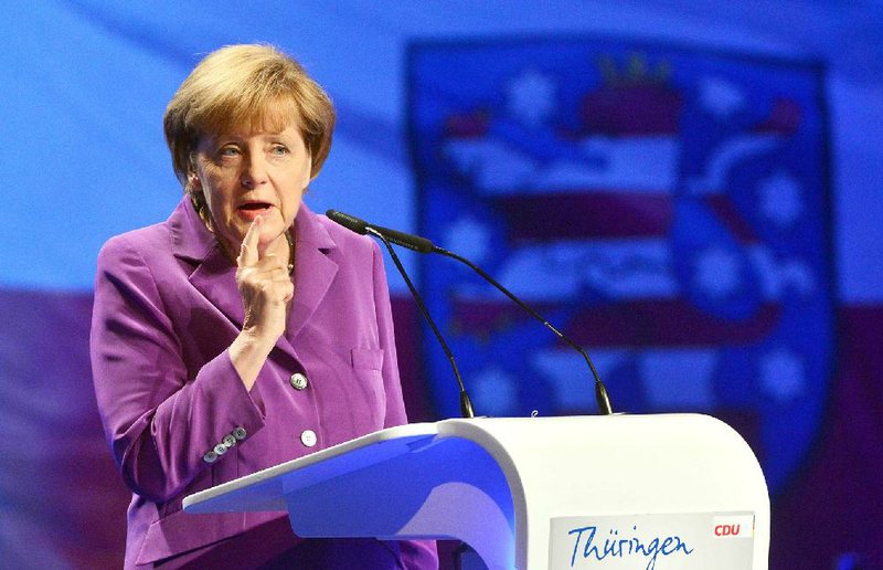 German Chancellor Angela Merkel, in an interview Saturday, accused the United States of using outdated Cold War intelligence methods but said that wouldn’t affect “cooperation” on projects.