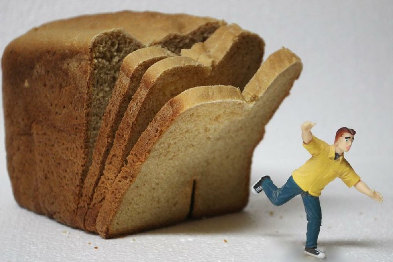 Arkansas Democrat-Gazette photo illustration/CELIA STOREY
Man fleeing bread.