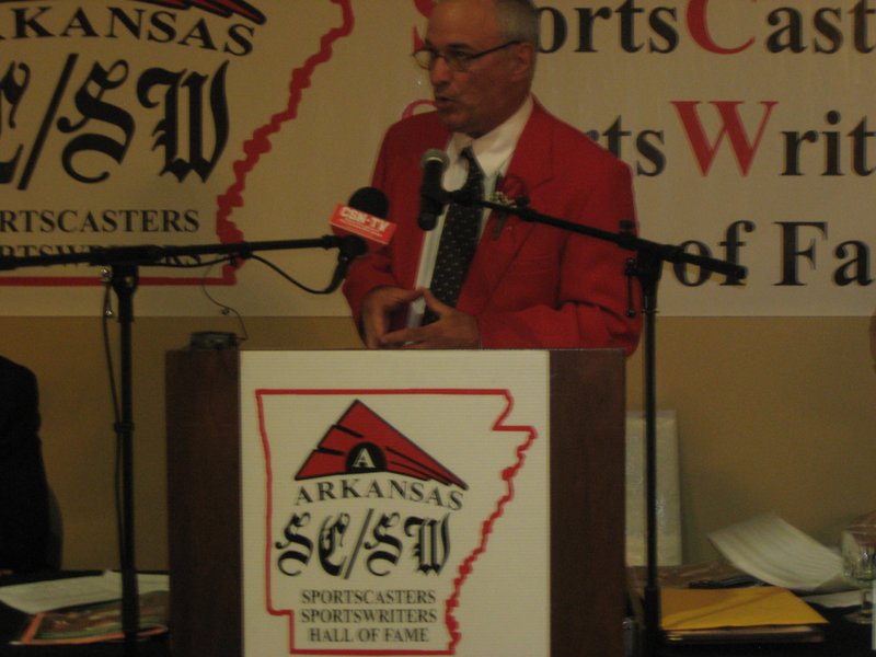 SPECIAL TO NWA MEDIA &#8212; Clay Henry, Hawgs Illustrated publisher, gives his induction speech at Saturday night&#8217;s Arkansas Sportscasters and Sportswriters Hall of Fame banquet in Conway.
