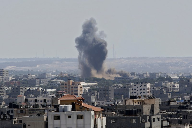 Smoke rises after an Israeli missile strike in Gaza City on Tuesday, July 15, 2014. The Israeli military says it has resumed airstrikes on Gaza after Hamas militants violated a deescalation brokered by Egypt. 