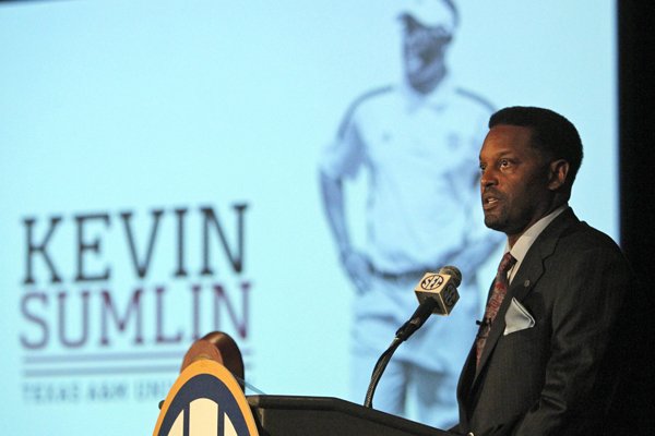 Texas A&M coach Kevin Sumlin speaks to the media at the Southeastern Conference NCAA college football media days, Tuesday, July 15, 2014, in Hoover, Ala. (AP Photo/Butch Dill)