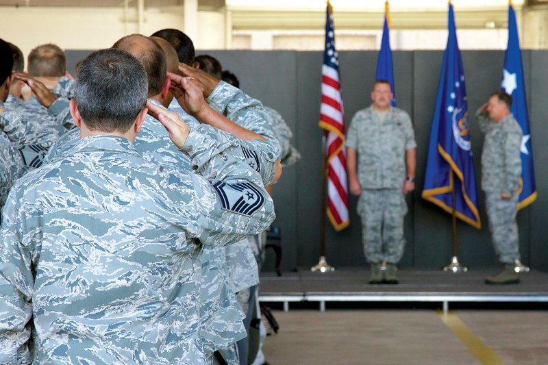 Airmen salute Maj. Gen. Mark A. Kyle, 22nd Air Force commander, at an activation ceremony for the 913th Airlift Group at the Little Rock Air Force Base on Sunday.

