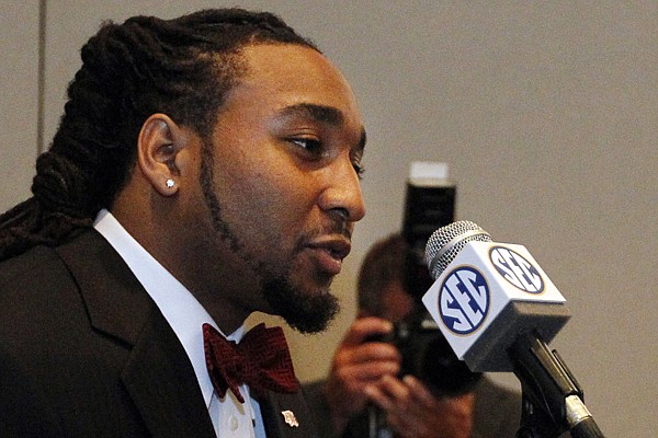 Arkansas safety Alan Turner speaks to the media at the Southeastern Conference NCAA college football media days, Wednesday, July 16, 2014, in Hoover, Ala. (AP Photo/Butch Dill)