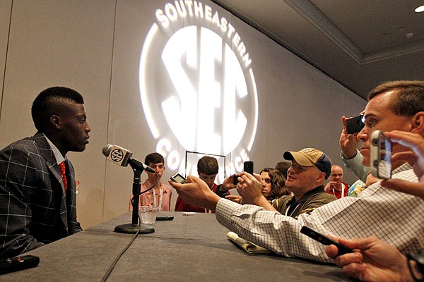 Texas A&M defensive back Deshazor Everett speaks to the media at the Southeastern Conference NCAA college football media days, Tuesday, July 15, 2014, in Hoover, Ala. (AP Photo/Butch Dill)