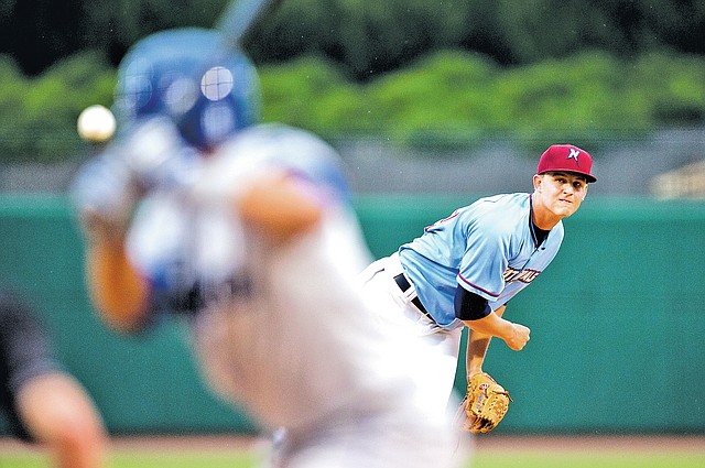 STAFF PHOTO SAMANTHA BAKER @NWASAMANTHA Christian Binford of the Northwest Arkansas Naturals delivers a pitch Wednesday at Arvest Ballpark in Springdale during the game against the Tulsa Drillers.