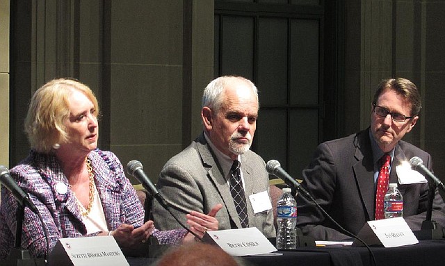 SARAH D. WIRE/Arkansas Democrat-Gazette
Walmart Vice President of Corporate Affairs Lee Culpepper (far right) listens during a U.S. Chamber of Commerce panel on how cities and businesses are welcoming immigrants. Joining him on the panel were St. Louis Mosaic Project Executive Director Betsy Cohen (left) and Idaho State Refugee Coordinator Jan Reeves. 
