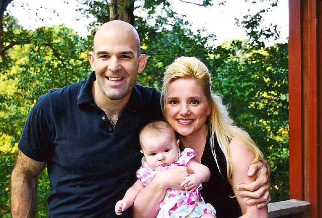 Marine Maj. Douglas Zembiec, seen in this undated photo with wife Pam and daughter Fallyn, four months old at the time, died May 11, 2007 in Baghdad during an operation for the CIA Special Activities Division's Ground Branch. Illustrates MARINE-CIA (category a), by Thomas Gibbons-Neff (c) 2014, The Washington Post. Moved Tuesday, July 15, 2014. (MUST CREDIT: Photo courtesy of Pam Zembiec)
