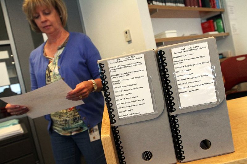 Arkansas Democrat-Gazette/BENJAMIN KRAIN --07/18/2014--
William Jefferson Clinton Presidential Library Supervising Archivist Rhonda Young makes previously unreleased documents from Bill Clinton's Presidency available to the public on Friday shortly after the expiration of the 12 year time period of the Presidential Restrictions Act expired.