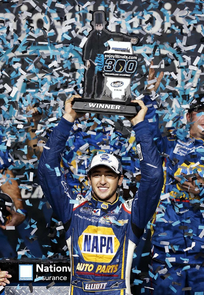 Chase Elliott celebrates in Victory Lane after winning Saturday’s NASCAR Nationwide Series race at Chicagoland Speedway in Joliet, Ill. It was Elliott’s third victory of the season.