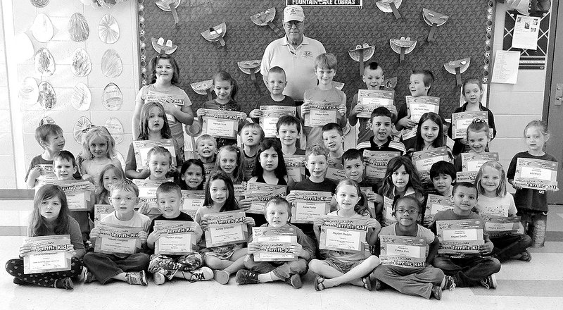 Submitted photo SGM Fred Camacho, representative of the Greater Hot Springs Village Kiwanis Club, recognized Fountain Lake Elementary Terrific Kids for the fourth nine weeks. Students were honored for improvement in academic achievement, behavior and human support. The students were presented a Terrific Kid bumper sticker and certificate for their accomplishments. Kindergarten and first-grade students to be named Terrific Kids, from left, were Stefania Miranovic, Theran Hodgson, Hayden Wilson, Ashley Chandler, Chase Rigsby, Hayden Reddin, Emma Cox and Aspen Smith; second row, Daniel Minton, Paige Shank, Seth Cole, Zoi Fell, Brooklyn Williams, MacKenzie Thornton, Kaine Porter, Zayden Richardson, Anna-Marie Duck, Noah Gonzalez and Rayne Bassett; third row, Jacob Keener, Abigail Accord, Kyra Spradlin, London Eaton, Allen Cook, Cameron Garner, Ethan Awana, Makhi Mohammed, Linlee Hardin, Lexi Poor and Lily Ward; back row, Annabelle Tucker, Hannah Scott, Aden Willey, Destyn Fields, Eddie Lloyd, Zacharie Seals and Paris Altorfer. Not pictured are James Spears and Madison Spainhour.