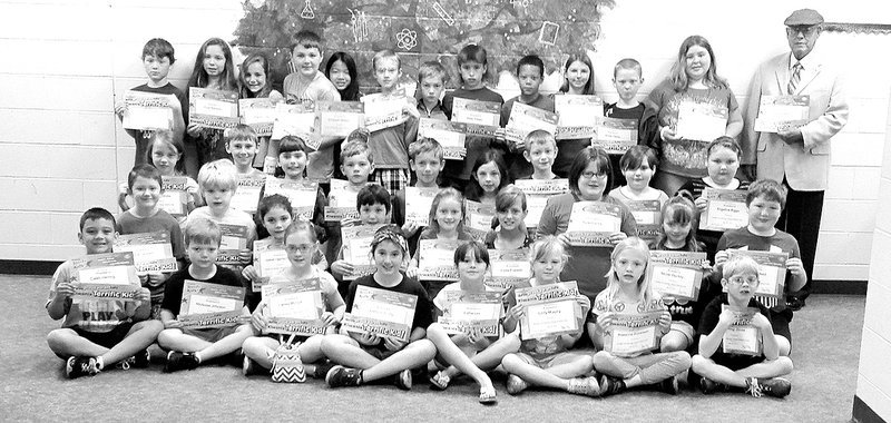 Submitted photo Greater Hot Springs Village Kiwanis Club SGM Fred Camacho recognized Fountain Lake Elementary Terrific Kids for the fourth nine weeks. Students were honored for improvement in academic achievement, behavior and human support. The students were presented a Terrific Kid bumper sticker and certificate. Students in second, third and fourth grade to be named Terrific Kids, from left, were Caleb Herring, Nicholas Johnson, Lainey Mungle, Gatlynn Scully, Callie Lee, Emily Murphy, Raeanna Robertson and Sterling Jones; second row, Blane Lambert, Jaxon Morkes, Isabel Ugartechea, Scotty Davis, Carley Tillery, Haley Franklin, Kyra Graves, Nicole Stuckey and Seth Burchfield; third row, Madisyn Harvey, Andrew Jeffress, Emily Addie, Abe Rose, Garrett White, Megan Price, Wyatt Peters, Mariah Minton and Angelina Biggs; back row, Colby Lambert, Toni Rebledo, Kaedn Day, Landin Kizer, Cimberli Stillian, Isaac LaCaze, Connor Tillery, Isaac Perez, Steven DeArmon, Reanna Norman, James Davis and Maria Scroggins. Not pictured are Gordon Hoople, Kadin Hilton, CeCe Twiggs, Ava Wendland and Kassadey Hibbs.