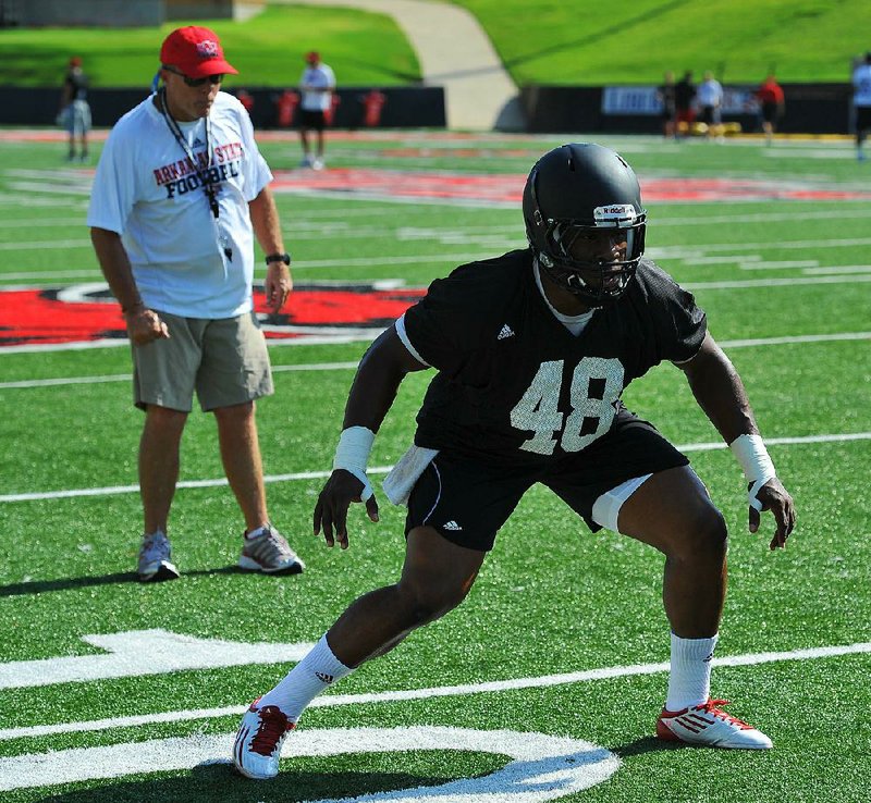 Arkansas State linebacker Qushaun Lee was named the Sun Belt Conference’s preseason defensive player of year and was one of four Red Wolves to be selected to the league’s first-team defense.