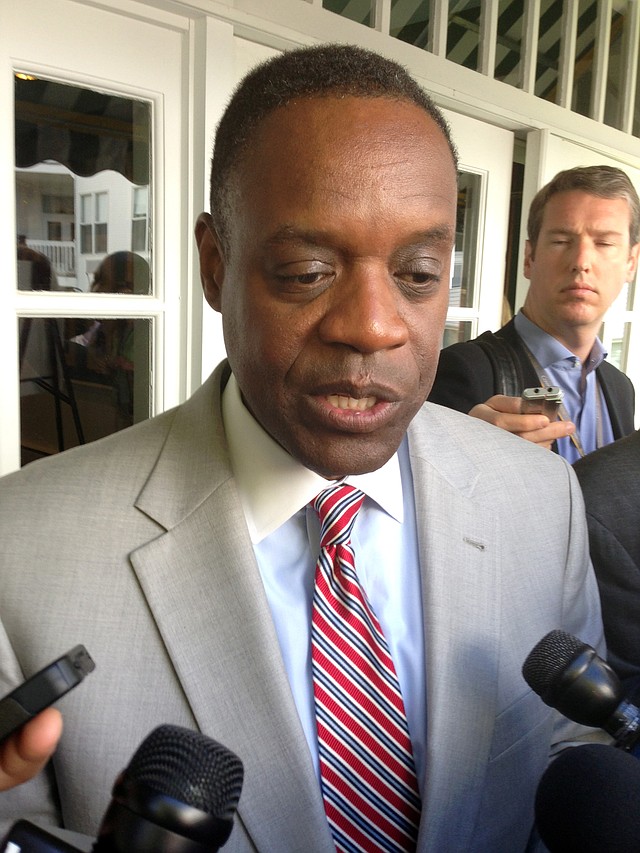  In a May 30, 2014 file photo, Detroit emergency manager Kevyn Orr speaks with reporters after addressing the Mackinac Policy Conference on Mackinac Island, Mich. In the little more than a year since Orr made Detroit the largest U.S. city to seek bankruptcy protection, it has experienced a wide range of improvements that will factor into Judge Steven Rhodes' decisions during next month's bankruptcy trial. A major piece of the bankruptcy puzzle could fall into place Monday, July 21, 2014, with the expected release of the results of a vote by creditors, including more than 30,000 retired and current city workers, on whether to accept millions of dollars in cuts. 