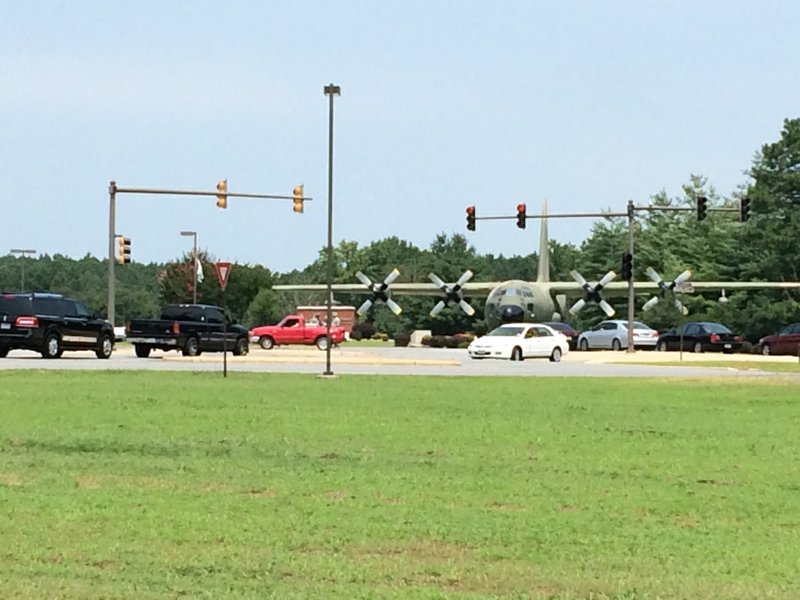 Traffic backs up Wednesday, July 23, 2014, around the Little Rock Air Force Base in Jacksonville, which was put on lockdown because of a "suspicious individual."