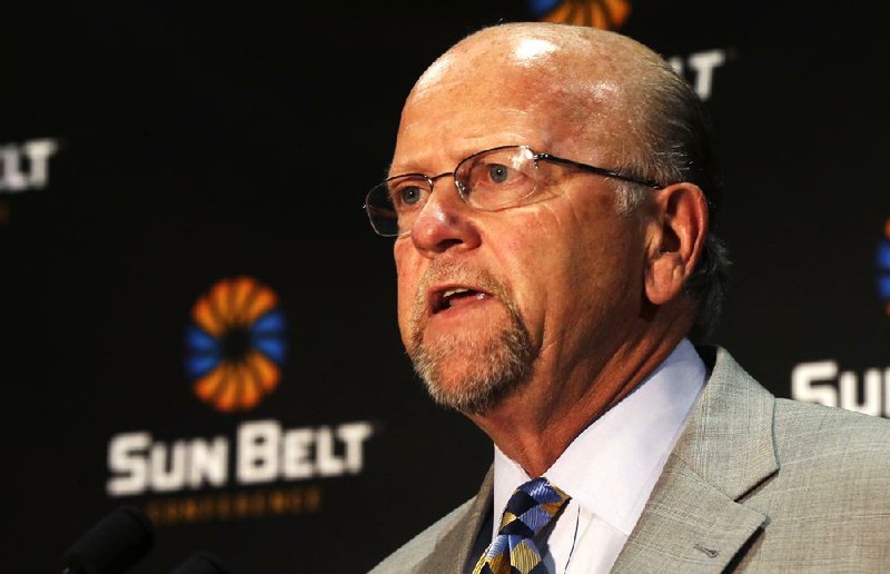 Sun Belt Commissioner Karl Benson talks during the Sun Belt media day in New Orleans, Tuesday, July 22, 2014. (AP Photo)